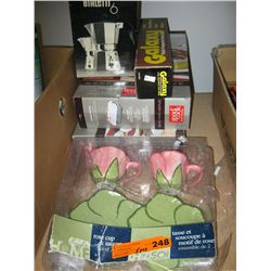Two boxes of baking tins, box of glasses