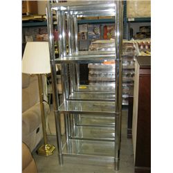 Three tiered metal stand with glass shelving