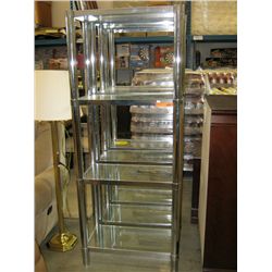 Three tiered metal stand with glass shelving