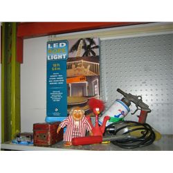 Assortment of toys, paint sprayer