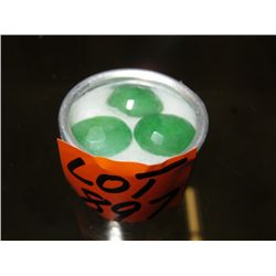 Tin display case with 3 x natural emeralds