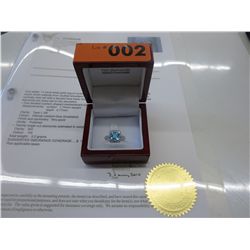 14kt white gold blue topaz & diamond ring.