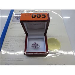3 carat amethyst ring set with 5 diamonds.
