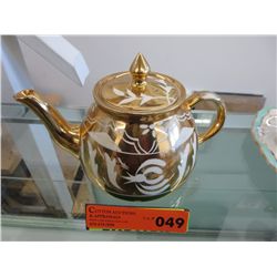 Gold lusterware teapot