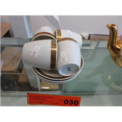 4 teacup and saucers