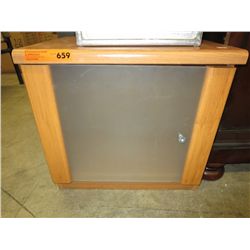 Small storage unit with glass door