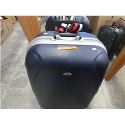Hard sided Samsonite rolling suit case