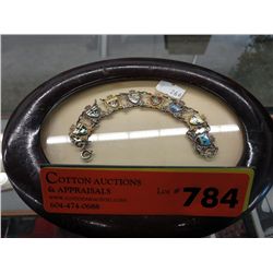 Vintage silver bracelet with enameled shields