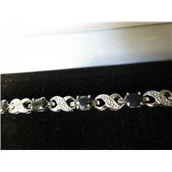 Blue sapphire & diamond tennis bracelet