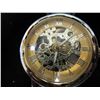 Image 1 : Man's wind-up skeleton watch. 2-sided