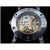 Image 2 : Man's wind-up skeleton watch. 2-sided