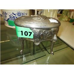 Silver plated jewelry box with cupid on top