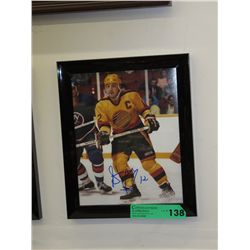 Signed  Hockey photo - Signed by "Stan Smyl"