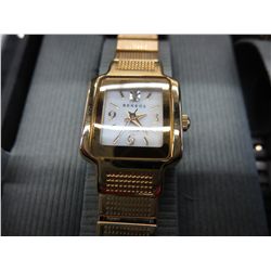 Ladies watch with matching bracelet