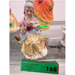 English china figure of a lady and dove 7" tall