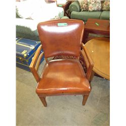 Vintage upholstered wood armed chair