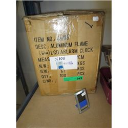 Case containing 100 alarm clocks