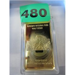 100 mils .999 fine gold clad timber wolf bar.