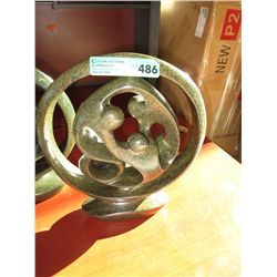 Carved soapstone family circle statue