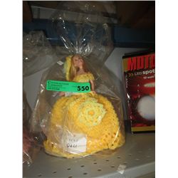 Yellow crochet tissue doll
