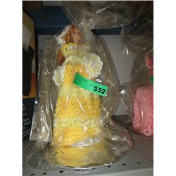 Yellow crochet tissue doll