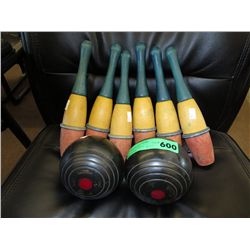 Antique pins and ebonite balls for lawn bowling