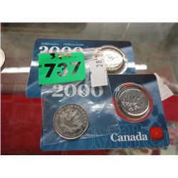 Three Canadian millennium quarters