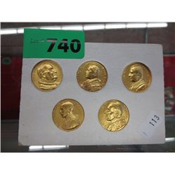 Five commemorative Pope coins