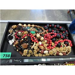 Tray of mostly wood bead jewelry