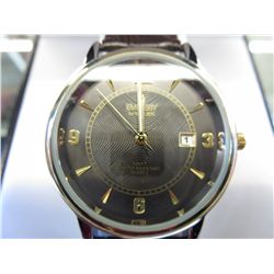 Man's 100 foot waterproof Gruen watch
