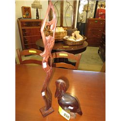 Two carved wooden figurines