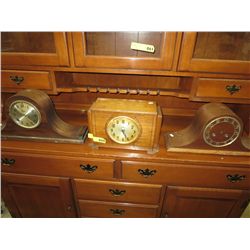 Three vintage wooden clocks