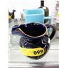 Image 1 : Two jugs with logos