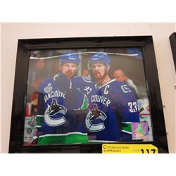 Autographed hockey photo Daniel & Henrich Sedin