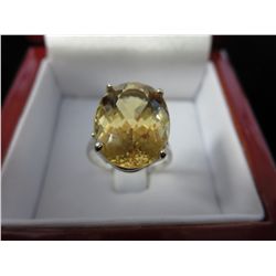 Faceted yellow beryl solitaire ring