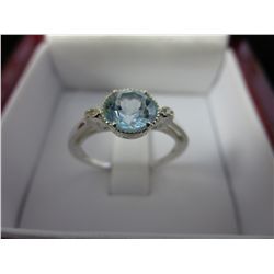 Blue topaz & diamond ring
