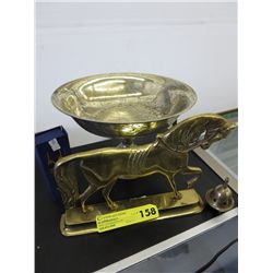 Four pieces of decorative brass