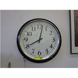 Large round metal framed clock 22" dia.