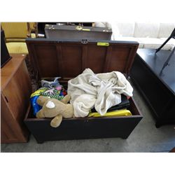 Wooden chest filled with children's toys