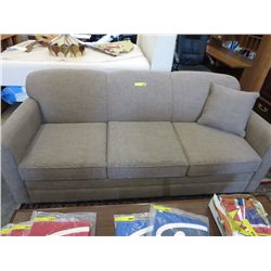 Grey upholstered hide-a-bed.