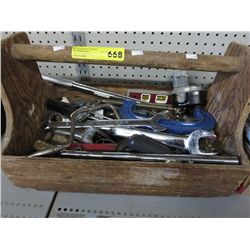 Wooden tool caddy containing tools
