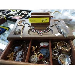 Vintage and costume jewelry in dresser top box