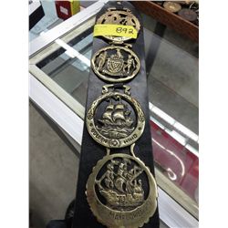 Horse brass decoration with ship motif