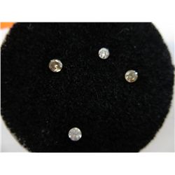 Four single round cut genuine diamonds
