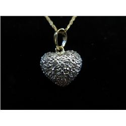 14KT solid gold pendant set with 26 diamonds