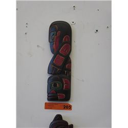Carved wall plaque. "Wild Man Raven"
