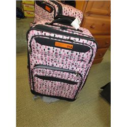 Signature brand pink luggage