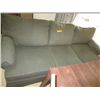 Image 1 : Green upholstered sofa , used