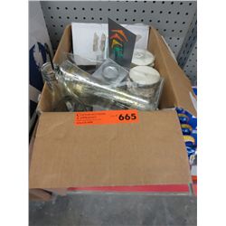 Box of new candles and holders