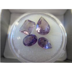 Four genuine cut Amethyst gemstones